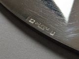a close up of a knife on a table