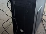 a computer that is sitting on the floor in the room