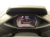 the dashboard of a car with a digital display in the center