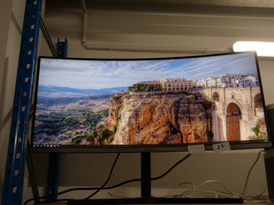 a computer monitor with a picture of a castle on the screen