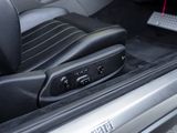 a suitcase in the trunk of a car with the door open