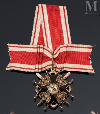 l'image d'une médaille ornée d'une étoile et d'un ruban autour du cou