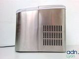 a silver toaster sitting on a white counter top