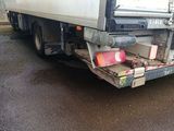 a truck that is parked on the side of the road