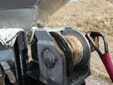 a boat with a winch attached to the side of it