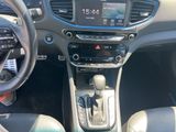 the interior of a car with a dashboard and steering controls