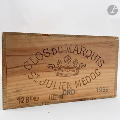 boîte en bois avec une étiquette indiquant « Clos du Marques, Saint-Julien, Médoc »