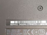 a close up of a laptop with a barcode on it