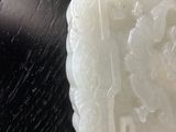 a picture of a carved soap dish on a table