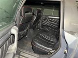 an image of the inside of a car with the door open
