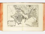 an open book with a map of a city on it