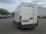 a white van that is parked in a parking lot