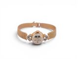 an image of a close up of a bracelet with a skull on it