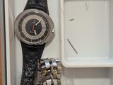 two watches that are sitting inside of a box