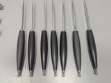 five different tools that are sitting on a table