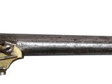a close up of a gun on a white background
