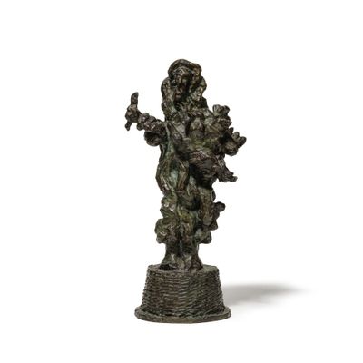 an image of a statue of a woman holding a child