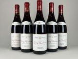 six bouteilles de vin rouge alignées