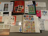 a table with a lot of different stamps on it