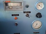 a control panel with various gauges and gauges on it