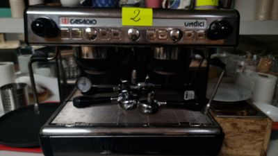 a coffee machine sitting on a counter in a kitchen
