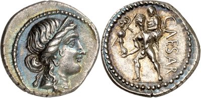 a silver coin with an image of a woman and a man on it