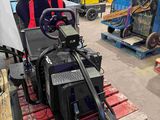 une image montrant la construction d'une voiture dans une usine