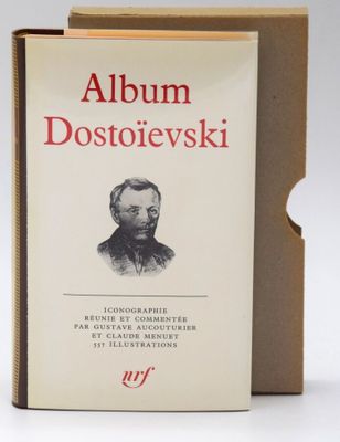an open book with a picture of a man in a suit and tie