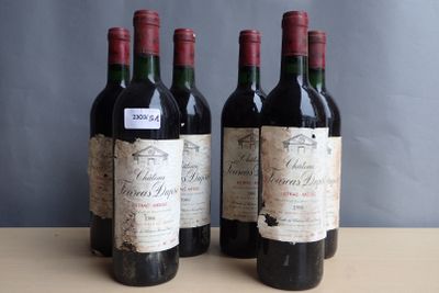 three bottles of wine sitting on top of a table next to each other