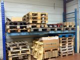 many pallets of boxes and boxes in a warehouse