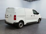 a picture of a white van parked in a room
