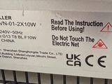 a sign on the back of a refrigerator that says it is not working