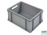 a close up of a gray plastic crate on a white background