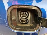 a close up of an electric car charging station