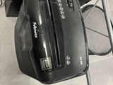 a black suitcase sitting on top of a metal rack