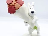 a white bear holding a bunch of flowers in his hand