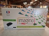 an image of a black toner for a printer in a box