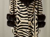 an image of a zebra print coat on a mannequin mannequin