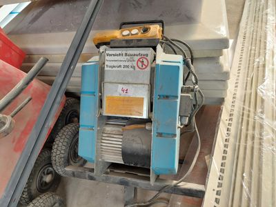 a machine that is sitting on the back of a truck