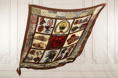 an image of a quilt hanging on a clothes line