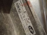 a sticker on the side of a metal container
