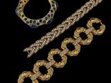 a collection of jewelry including a bracelet, bracelet and ring