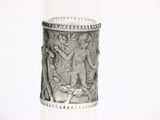 a candle that has a picture of a man and a woman on it