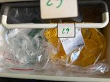 a plastic container filled with cookies and other food items