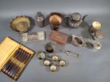 a lot of silver items that are on the table