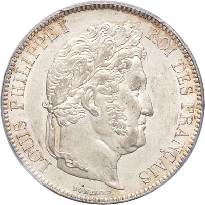 a close up of a coin on a white background
