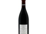 a bottle of wine that is sitting on a table