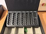 a briefcase with a keyboard and a key board inside of it