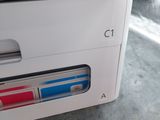 a close up view of a drawer with a clock on it