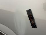 a close up of a sticker on the hood of a car